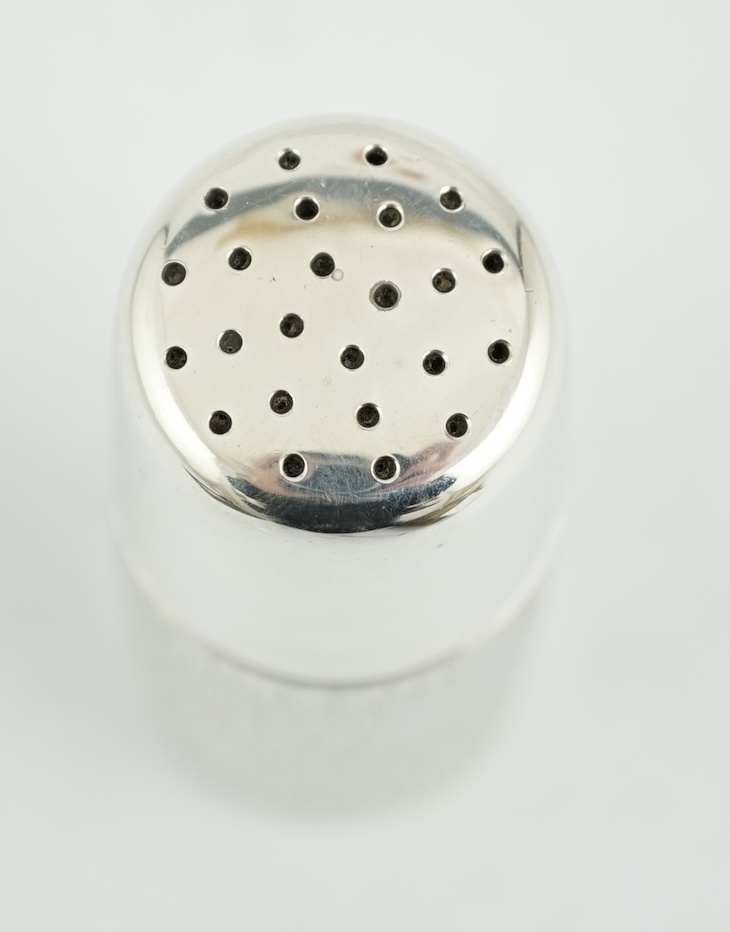 An Elizabeth II part textured silver sugar caster by Adrian Gerald Benney